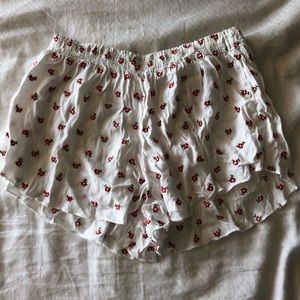brandy melville white shorts with red flowers